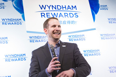 Noah Brodsky, Wyndham Hotel Group senior vice president of worldwide loyalty and engagement, addresses media at a press conference following the announcement that Wyndham Rewards, the company's award-winning loyalty program, has surpassed 50 million members.