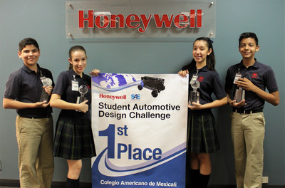 Team members Alan Monroy, Cassandra Maese, Rocἰo Silenciario and Galo Fimbres are recognized by Honeywell for their winning "The Emperor of Wheels" toy car company project in the Student Automotive Design Challenge.