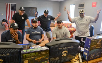 Veterans compete against one another during a gaming connection event.