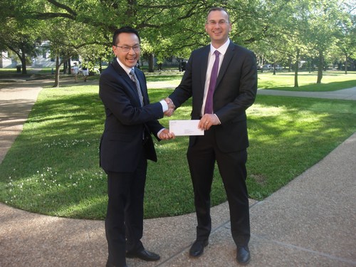 Jeff Chaapel, General Manager of OMNOVA Oil & Gas, presents $50,000 grant to Dr. Michael Wong, Rice University's Chemical and Biomolecular Engineering Department Chair.