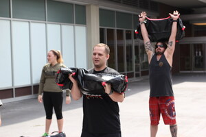 Wounded Warrior Project Hosts Challenging Sandbag Workout for Injured Veterans