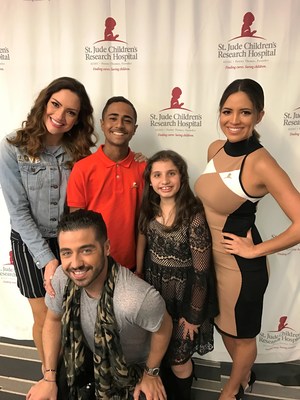St. Jude patients Christopher and Victoria with Primer Impacto team