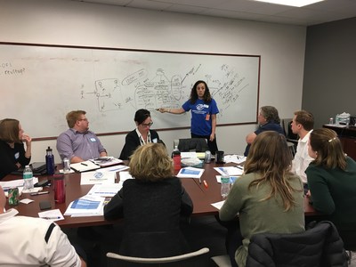 OppenheimerFunds' employees participating in an onsite skills-based volunteering program in Denver.