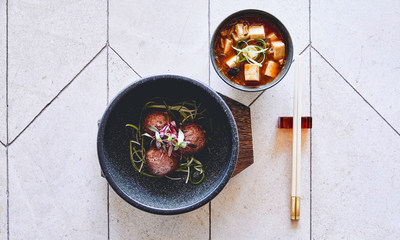 Ma Po Tofu, a unique take on meatballs made with Impossible Burger meat, chili paste, shiitake mushrooms and green onion.