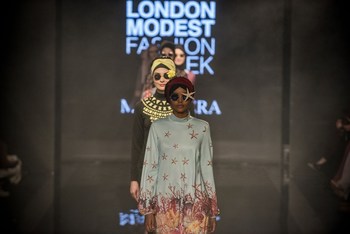The world's first hijabi model Halima Aden leads on catwalk for Turkish swimwear designer Mayovera at Modanisa London Modest Fashion Week