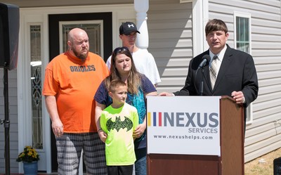 Nexus Services CEO  and President Mike Donovan presents brand-new home to the Truslow family of Augusta County, Virginia through Nexus Services’ annual Christmas Miracle Program.