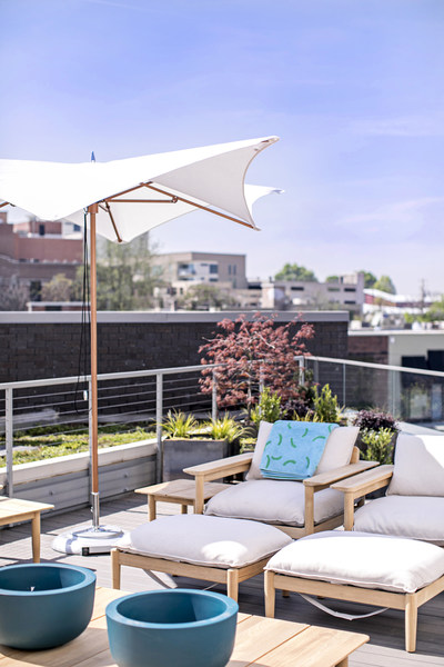 The Outdoor Terrace features collections for dining and lounging al fresco – as well as a skyline view. Photo by Heidi Geldhauser.