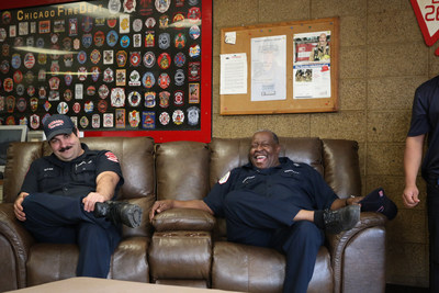 Chicago firemen check out their new furniture which was donated by The RoomPlace on Friday, April 14.