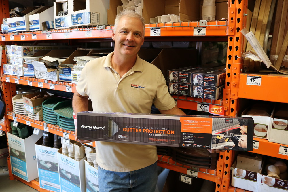 Robert Lenney holds his UL certified gutter guard available at HomeDepot.com and participating Home Depot stores.