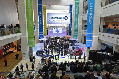 International media and attendees listening to keynote presentation by Carlos Ghosn, Chairman of the Board, Nissan Motor Co., Ltd. at AutoMobili-D during the 2017 North American International Auto Show.