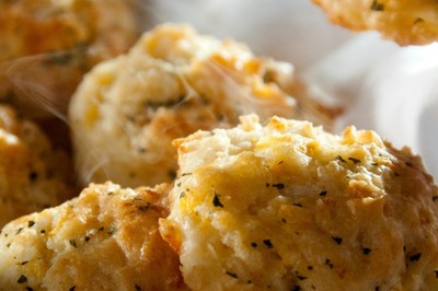 Mixed in-restaurant by hand using a top-secret recipe, Red Lobster’s Cheddar Bay Biscuits are made every 15 minutes with quality-aged Cheddar cheese and finished with a savory garlic topping.