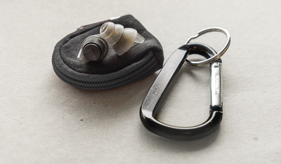 The water-durable carrying case, carabiner, and lanyard that every supporter will receive if Axil reaches their new stretch goal of $200,000.