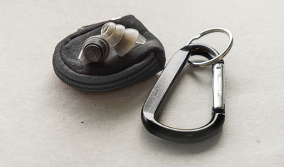 The water-durable carrying case, carabiner, and lanyard that every supporter will receive if Axil reaches their new stretch goal of $200,000.