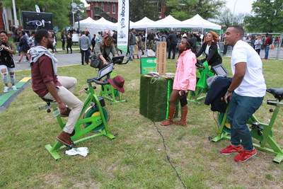 In an effort to charge their phones, festival-goers take a spin on electric-fueled stationary bikes at the Toyota Green Initiative activation space during the 2016 Broccoli City Festival in Washington D.C. Toyota is back as a major sponsor of this year’s eco-friendly music festival. This event is just one of many the brand will sponsor throughout the year under its African-American millennial-focused sustainability platform, the Toyota Green Initiative. (Photo: Donald Traill)