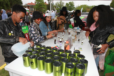 Sustainability expert and Toyota Green Initiative coalition member, Yoli Ouiya, shows festival-goers how to make their own eco-friendly body oils during the 2016 Broccoli City Festival in Washington, D.C. Toyota is back as a major sponsor of this year’s eco-friendly music festival. This event is just one of many the brand will sponsor throughout the year under its African-American millennial-focused sustainability platform, the Toyota Green Initiative. (Photo: Donald Traill)