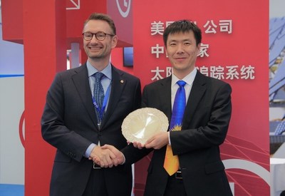 Mr. Bruce Wang, the CTO of Arctech Solar was granted the UL certificate by Edvard Jensen, general manager of UL company