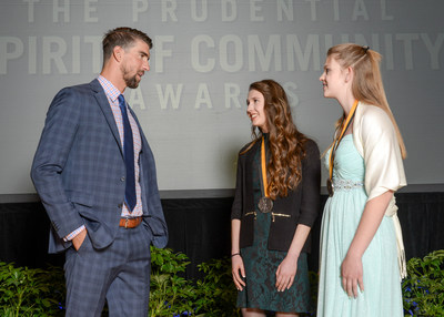 Olympic gold medalist Michael Phelps congratulates Sophia Skwarchuk, 18, of Kalispell (center) and Hannah Halvorson, 13, of Laurel (right) on being named Montana's top two youth volunteers for 2017 by The Prudential Spirit of Community Awards. Sophia and Hannah were honored at a ceremony on Sunday, May 7 at the Smithsonian's National Museum of Natural History, where they each received a $1,000 award.