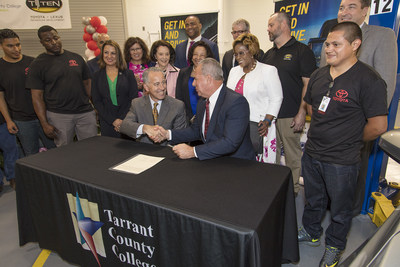 (L-R) Chris Nielsen, Toyota Executive VP,  signing the official partnership agreement with Tarrant County College Chancellor Eugene V. Giovannini