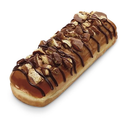 7-Eleven Inc. is introducing its first fresh donut topped with chocolate bar pieces, and the world’s largest convenience retailer selected one of America’s top 10-selling chocolate candies for the honor – TWIX Caramel Cookie Bars.