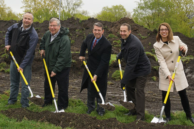 Shovels in dirt at the ceremonial groundbreaking for Westgate Dental Care's new state-of-the-art facility. Pictured from left to right: Arlington Heights Chamber of Commerce Executive Director Jon Ridler, Village of Arlington Heights Trustee Bert Rosenberg, Village of Arlington Heights Mayor Tom Hayes, Westgate Dental Care owner Dr. Peter A. Kics, and Westgate Dental Care owner Teja Kics.