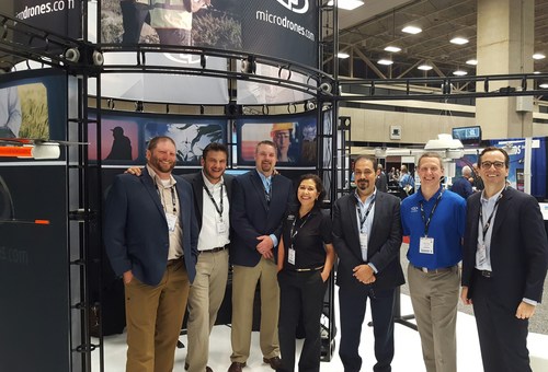 The Microdrones team at their booth, #1031, at AUVSI XPONENTIAL. Pictured from left to right: Chuck Dorgan, Mike Dziok, Rick Rayhel, Elena Rodriguez, Dr. Mohamed Mostafa, Mike Hogan, and Vivien Heriard Dubreuil.