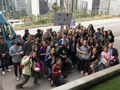 Students from the nonprofit Earth Peace encourage LAUSD board members to vote in support of a pilot program to test-drive daily plant-based vegan entrées and nondairy beverage options.