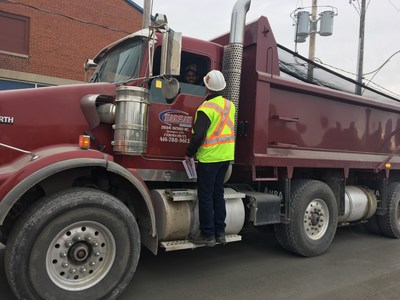 Representatives from Toronto Hydro, Electrical Safety Authority and GFL Excavating spoke to dump truck drivers in downtown Toronto about powerline safety today. (CNW Group/Toronto Hydro Corporation)