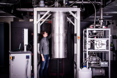 IBM Research Staff Member Katie Pooley, an Applied Physics PhD from Harvard who joined IBM in 2015, at the Thomas J Watson Research Center, is a process integrator on the IBM Q team. In the photo, Pooley is examining a cryostat with the new prototype of a commercial quantum processor inside.