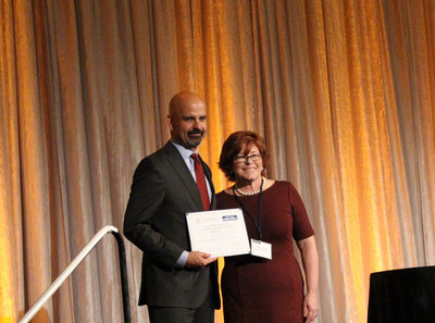 Photographed left to right: President of the Seattle Foundation, Tony Mestres and Vice President of Marketing for Inspirus Credit Union, Sherry Lotze.