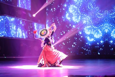 Qiangba Yangzhen is performing folk dancing