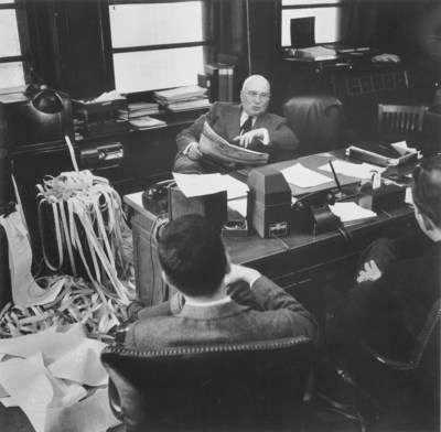 Gerald Loeb, at his desk, in his Midtown Manhattan office (c. 1950). Gerald Loeb was a founding partner of E.F. Hutton, a guest columnists for Forbes Magazine and widely considered a Wall Street iconoclast. The 2017 Loeb Awards will celebrate the 60th Anniversary of Gerald Loeb’s legacy, announce the 2017 competition winners and honor two career achievement recipients on Tuesday, June 27 at Capitale in New York City. http://www.theloebawards.com