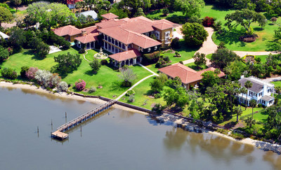 Platinum Luxury Auctions has announced the upcoming sale of this spectacular waterfront mansion located in Daytona Beach, Florida. Built and owned by the France family, the founders of NASCAR, the property offers 3.8 acres and more than 325 feet of water frontage on Daytona’s Halifax River. Though not previously offered for sale, the home was appraised for $13.8 million. Discover more at RiverfrontLuxuryAuction.com. Pictured: An aerial view of the estate.