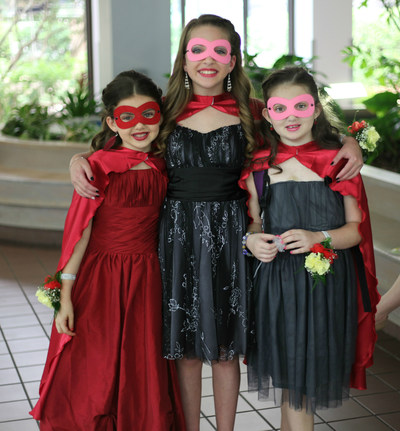 Patients at St. Joseph's Children's Hospital in Tampa trade their hospital gowns for formal attire and prepare to dance the night away during a Superhero-themed prom held in the hospital's auditorium Friday, May 19, 2017. Photo by Kim Wallace