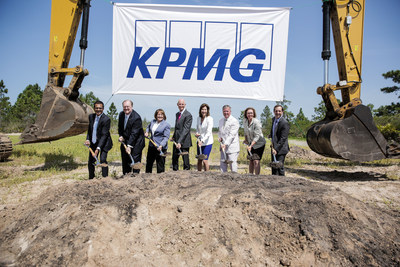 KPMG Chairman and CEO Lynne Doughtie (center right) and Florida Governor Rick Scott (center left) joined by other leaders at groundbreaking ceremony for KPMG's learning, development and innovation facility.