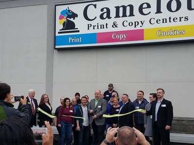 The Camelot team shown here during their recent Grand Opening of a new office.