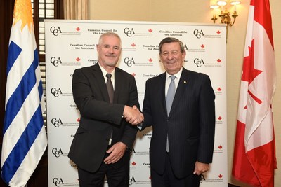 Steve Fabijanski, President and CEO of Agrisoma Biosciences Inc. (on left) signs agricultural food security partnership with Uruguay's Minister of Foreign Affairs, Rodolfo Nin Novoa (on right) (CNW Group/Agrisoma Biosciences Inc.)