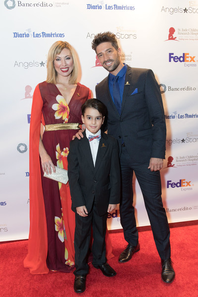 David Chocarro & Carolina Laursen with St. Jude patient Hender on the red carpet of the 15th annual FedEx St. Jude Angels & Stars Miami Gala on Saturday May 20th