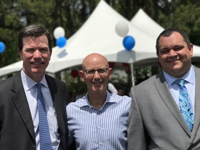 Ribbon cutting at Friendly Honda for their new expanded campus. From left to right: Brendan Cunningham, American Honda Motor Company, Eric Kahn President Friendly Auto Group and Josh Streeper, American Honda Motor Company.