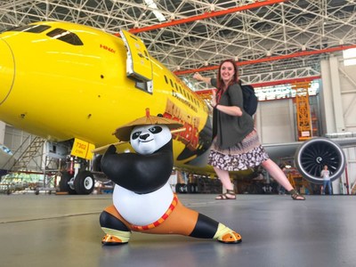 Hannah Foss, the winner of Hainan Airlines’ Design Your Own Livery contest in North America, visits the airline’s hangar