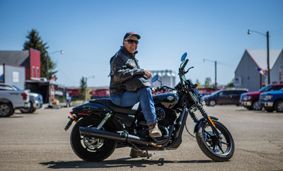 Mayor of Ryder, Jody Reinisch, presides over the town’s Main Street. To launch riding season, Harley-Davidson will ride into Ryder Saturday, June 3 with the aim of creating the first fully motorcycle licensed town. Ryder city officials will change the town’s name to “Riders” this riding season to commemorate the experience.