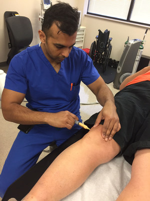 Patient's own fat being injected by Dr. Mittal
