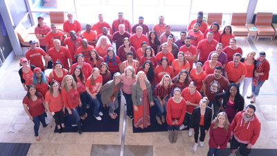 A group of Bridgepoint Education employees participate in Remember Everyone Deployed (RED) shirt Friday.