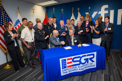 Jim Samaha, Senior Vice President of Comcast's Freedom Region, joined by New Jersey Employer Support of the Guard and Reserve Committee Chair Don Tretola, as well as Comcast and local military personal after signing the ESGR Statement of Support on Monday, June 5, in Voorhees, NJ.