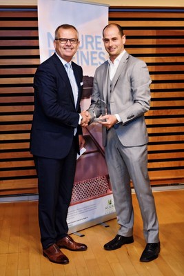Toronto Hydro President and CEO Anthony Haines (left) was presented with an award from Corporate Knights CEO and co-founder Toby Heaps (right) at an event in Toronto last night. Toronto Hydro was recognized as the top-ranked company on Corporate Knights’ fourth annual Future 40 Responsible Corporate Leaders in Canada list. (CNW Group/Toronto Hydro Corporation)