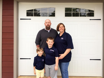 The Glenn family in front of their recently completed custom, adaptive home built through the Carrington Charitable Foundation’s signature program, Carrington House. Back row, L- R: U.S. Army Master Sgt. David Glenn and Robin Glenn, front row, L-R, Megan Glen and Wyatt Glenn.