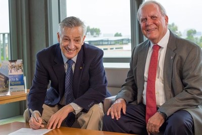 IEEE CS President Jean-Luc Gaudiot, and Gary Matkin, Dean of DCE/UCI, at MoU signing ceremony.