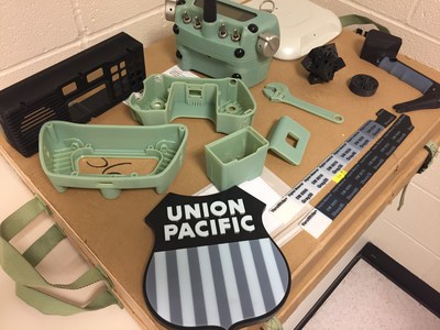 All items pictured were 3-D printed by Union Pacific, including the black panel in the upper left-hand corner, which is now used to house the in-cab locomotive radio system.