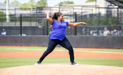 Wounded veteran Taniki Richard throws out the first pitch for the East Carolina University Pirates, at a recent Wounded Warrior Project event.
