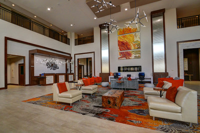 Guests at the Delta Hotels Chicago North Shore enjoy vibrant lobby décor and colorful accents.
