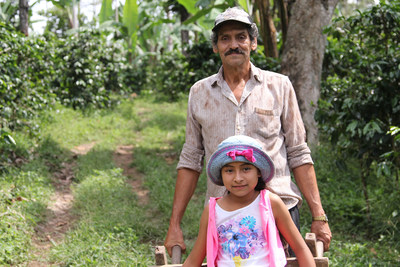 Gustavo Adolfo Talavera Herrera, a father of eight who grows coffee on 20 acres of his farm in Jinotega, Nicaragua, with his granddaughter, Maryering. Gustavo is one of the producers for LWR Farmers Market Coffee.